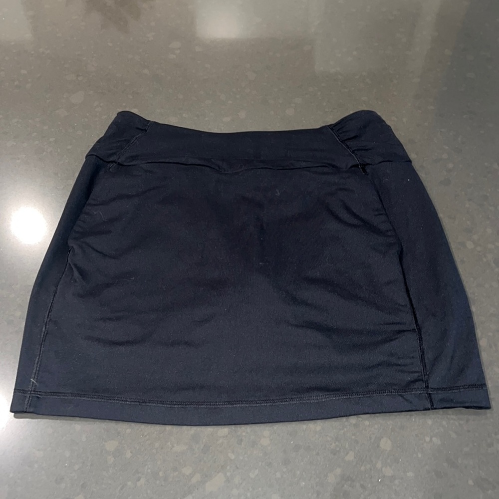 Black Under Armour golf skirt